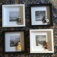 three black and white framed pictures with small figurines in them on a rug