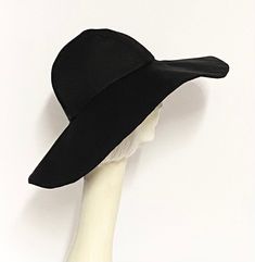 "Wide Brim sun hat made with black cotton twill , lined in rayon print, the hat has a 2 section crown 3 1/2 \" in length and a one piece 5\" brim, a cotton band inside. One size fits most up to 23\" Machine wash cold / hand dry Made in USA Press if needed / packable" Beret Hat Bow, Packable Hat, Wide Brim Sun Hat, Wool Berets, Black Chevron, Beret Hat, Brim Hat, Black Linen, Cotton Pads