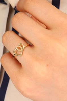 Cute Heart Ring - Dainty Stackable Ring - Intertwined Heart Ring - Gold Heart Ring - Dainty Ring Would you like to express your eternal love? This ring will be a great choice This solid gold dainty ring is made entirely from 14k solid gold. * Jewelry is packaged and shipped in a delicate jewelry gift box. * If you are purchasing it as a gift, please feel free to add a personal note. Anniversary, Gift For Wife, Christmas Gift Gold Kt: 14K solid gold * Available Gold Color:  * Guaranteed Authentic Love Gold Ring, Dainty Double Heart Promise Jewelry, Elegant Adjustable Heart Ring, Yellow Gold Jewelry With Heart Detail For Weddings, Yellow Gold Wedding Jewelry With Heart Detail, Adjustable Elegant Heart Cut Ring, Dainty Double Heart Promise Ring, Elegant Rose Gold Heart Ring For Mother's Day, 14k Gold Double Heart Ring For Gift