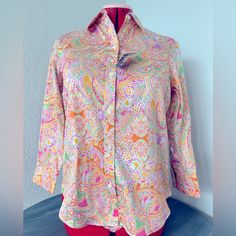 Chaps Classic No-Iron Blouse Bright Spring Paisley White Background, With A Beautiful, Bright Pink, Yellow, Orange, Green, White, And Purple Pattern Button Down Beautifully Tailored Long Sleeves Bust: 37 Inches Length: 21.5 Inches Size: Xs New With Tags Pink Printed Button-up Shirt, Feminine Multicolor Button-up Top, Feminine Multicolor Cotton Tops, Pink Long Sleeve Blouse For Daywear, Fitted Multicolor Shirt For Spring, Printed Multicolor Shirt For Daywear, Fitted Printed Pink Tops, Pink Fitted Button-up Blouse, Feminine Long Sleeve Multicolor Tops