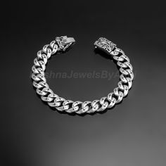 We offer only the finest silver jewelry in our collection. Material - Pure 92.5 Solid Sterling Silver Length - 8.50 Inches  Width  - 0.50 Inches Weight - 55 Gram Approx. Stamped 925 Free Standard Shipping Worldwide. Payment Policy :- We accept payment through PayPal. All payments must be made within 7 days of purchase. If you are experiencing some difficulty in paying through PayPal and need additional time, please  contact us. Shipping Policy :- All United States parcel will be shipped through USPS Shipping Service within 1-3 business days after received payment. (It takes 2 to 3 weeks to get it delivered) All Countries (Except USA) parcel will Be Shipped Through DHL E-Commerce Shipping/India Post within 1-3 Business Days after received payment. (It takes 3 to 4 weeks to get it delivered) Classic Engraved Cuban Link Jewelry, Silver Cuban Link Engraved Bracelets, Silver Engraved Cuban Link Bracelets, Silver Engraved Cuban Link Bracelet, Sterling Silver Cuban Link Jubilee Bracelet, Polished Sterling Silver Cuban Link Bracelet, Silver Cuban Link Chain Bracelets, White Gold Sterling Silver Chain Bracelet With Oxidized Finish, Classic White Gold Bracelets With Oxidized Finish