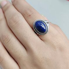 NOTE : WE USED NATURAL GEMSTONES , SO STONE  MAY BE LITTLE DIFFERENT .This  is a listing  of Boho sterling silver ring  # metal = sterling silver  925  # Gemstone  - Lapis Lazuli # Ring Size - Available in all Size  # Stone Color - Blue # Stone Shape - Oval Handmade Crafting bohemian Ring - This style has bohemian style . it will look beautiful when you wear it .. Thanks for visiting our shop ...  favorite our shop for daily updates ... Adjustable Bohemian Stackable Gemstone Rings, Bohemian Blue Stackable Round Rings, Adjustable Oval Bohemian Rings, Bohemian Stackable Gemstone Rings Oval Shape, Bohemian Adjustable Crystal Ring For Gifts, Bohemian Adjustable Crystal Ring As Gift, Bohemian Gemstone Midi Rings For Gift, Bohemian Adjustable Crystal Ring Gift, Bohemian Stackable Rings As Gift