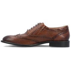 A classic that is always in fashion the Garland by Thomas & Vine. This genuine leather wingtip dress shoe features a 6 mm Tru Comfort Foam� footbed and a cushioned collar for all-day comfort. Classic brogue details and pebbled details top the look. Leather Wingtip Lace-up Shoes With Cushioned Footbed, Business Wingtip Lace-up Shoes With Cushioned Footbed, Classic Wingtip Lace-up Shoes With Cushioned Footbed, Business Wingtip Oxfords With Goodyear Welt, Classic Leather Wingtip Lace-up Shoes, Classic Brown Dress Shoes With Brogue Detailing, Classic Brown Brogue Dress Shoes, Classic Brown Wingtip Derby Shoes, Classic Lace-up Brogue Shoes With Moc Toe