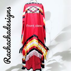 A Native American Tradecloth Dress Four Direction Tradecloth Dress with Four Direction Ribbon work throughout dress. White fringe trimming around opening of sleeves and outlining the bottom of ribbon work on front and back. Dress is made with red cotton fabric and black cotton on sleeves and gussets. Ribbon work to gussets on bottom. Ribbon work done on an angle using black, red, yellow and white ribbons; ribbons trail from the sides on front and back. An opening on sleeves to let arm come out o Traditional Red Tunic Dress, Fitted Red Fringe Dress, Red Silk Festival Dress, Fitted Red Dress With Fringe, Fitted Red Tunic Dress, Red Fitted Tunic Dress, Ribbon Dresses, Camp Dress, Native Dress