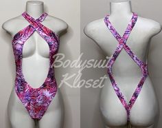 Welcome to my shop Let's Make Money Together 💕 DETAILS  * Handmade Item  * Materials: Nylon, Spandex * Crossed Over Bodysuit  * Never used  DESCRIPTION  * Thong Bodysuit  * Pink Electric Spandex  * 4 way stretch Fabric  * Mannequin is wearing  XS/Small (may choose sizing at Checkout)  SHIPPING  My current shipping turnaround is really quick 1 to 2 days  RETURNS & EXCHANGES  No refunds or exchanges if you have any issues with your purchase please feel free to reach me personally. I can accommoda Pink Bodysuit For Festivals, Pink Fitted Bodysuit For Festivals, Fitted Pink Bodysuit For Festivals, Festival Fitted One-piece Bodysuit, Fitted One-piece Bodysuit For Festival, Fitted T-back Bodysuit With Lined Body, Summer Festival Dancewear Bodysuit, Summer Dancewear Pink Leotard, Pink Stretch Bodysuit For Festivals