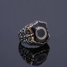 This special ring will be best part of your collection. This is a customization available vintage pagan statement ring for men. You can make customization on the top symbol. Can be Odin's bird Raven and Valknut, symbol of natural balance Thors Hammer, Gungnir, Vegvisir and troll cross etc..Please contact for your customization details. Looking for a unique, one of a kind GIFT FOR HIM, groomsman gift, father's day gift, teacher day gift? Look no further. This cool gemstone ring is the right answe Symbolic Open Ring Metal Jewelry, Symbolic Jewelry With Open Metal Ring, Spiritual Black Engraved Sterling Silver Ring, Symbolic Engraved Open Ring Jewelry, Spiritual Open Ring Jewelry With Ring Detail, Spiritual Engraved Open Ring Jewelry, Adjustable Engraved Snake Ring, Symbolic Black Promise Ring Jewelry, Symbolic Black Jewelry For Promise Ring