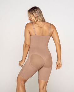 This bodysuit is the ultimate in technology, comfort, and shaping. It's made of our signature SkinFuse® fabric for moderate compression to shape your curves. Targeted compression adds a little extra shaping in the tummy and waist to gently create an hourglass effect. This bodysuit covers from the bust down to the knees and a flex-fit design at the thighs provides extra flexibility for comfortable wear. Lighter fabric in the bust and bottom prevent flattening. The bodysuit's seamless design makes Support Bras, Active Wear Leggings, Body Shapers, Personal Shopper, Shop Swimwear, Second Skin, Fitted Dress, Daily Wear, Women's Top