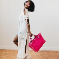 This is the perfect tote for the summer. It holds all your items for a day out on the town, running errands, to the office, gym, the beach, and more! The details in this bag are what make it so special and unique. This tote features hand-made fringe edges, a top zipper closure, an interior zipper pocket, and a coordinating scarf wrapped around the handle of the bag. The Chloe Canvas Fringe Tote also comes with a removable and adjustable strap, allowing you to style it as a crossbody bag. The han Chic Double Handle Beach Bag, Chic Beach Season Shopping Bag, Chic Pink Beach Bag For Summer, Tote Shoulder Bag For Day Out, Leather Handled Shoulder Bag For Day Out, Chic Spring Travel Beach Bag, Beach Season Shopping Shoulder Bag With Leather Handles, Trendy Beach Bag With Double Handle For Day Out, Trendy Double Handle Beach Bag For Day Out