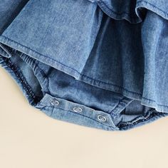 This smocked denim romper is beautifully designed with layered ruffles and comes with snaps at the bottom for quick and easy changing. A absolute must for this summer! Denim Ruffles, Denim Baby, Summer Baby Clothes, Baby Jeans, Toddler Romper, Denim Chic, Summer Denim, Casual Rompers, Ruffle Romper