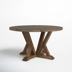 a round wooden table with two crossed legs on an isolated white background, the top is made out of wood