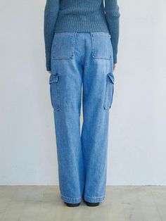 This is a denim version of the trendy cargo pant style. The pants have a straight fit that makes your legs look longer, and there are outside pockets on both sides to create a three-dimensional feel. It's great for mixing and matching with feminine items, and it's also good for styling with casual items like hoodies. - Practical with pockets on the front and back- Opening and closing with canton button and zipper- Can be styled with a belt- Branded leather patch on the back of the waist Urban Straight Leg Cargo Jeans With Pockets, Urban Straight Leg Cargo Jeans, Blue Cargo Jeans With Patch Pockets For Fall, Blue Straight Leg Utility Cargo Jeans, Denim Blue Straight Leg Bottoms With Flap Pockets, Spring Straight Cargo Jeans With Multiple Pockets, Relaxed Fit Straight Jeans With Multiple Pockets, Urban Straight Cargo Jeans, Blue Utility Cargo Jeans With Flap Pockets