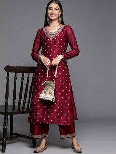 *  Colour: maroon   *  Ethnic motifs embroidered   *  Round neck   *  Long,  regular sleeves   *  Straight shape with regular style   *  Zari detail   *  Calf length with straight hem    *Fabric:-  Silk Blend  *Wash Care:-  Hand Wash *Package Contains:- Only One Kurta AVAILABLE IN 7 SIZES THEY ARE IN FOLLOWING MEASUREMENTS IN INCHES:- XXS:- Bust-32/To Fit Waist-26/Length-44/Hip-36 XS:- Bust-34/To Fit Waist-28/Length-45/Hip-38 S:- Bust-36/To Fit Waist-30/Length-45/Hip-40 M:- Bust-38/To Fit Waist-32/Length-45/Hip-42 L:- Bust-40/To Fit Waist-34/Length-45/Hip-44 XL:- Bust-42/To Fit Waist-36/Length-45/Hip-46 XXL:- Bust-44/To Fit Waist-38/Length-45/Hip-48 NOTE ►► Please feel free to contact us for any further questions.CUSTOMISATION We do customisation ️ ►► Please feel free to contact us for any Traditional Semi-stitched Embellished Kurta, Traditional Embellished Semi-stitched Kurta, Embroidered Long Sleeve Salwar Kameez For Reception, Long Sleeve Embroidered Salwar Kameez For Reception, Long Sleeve Embellished Kurta For Navratri, Embellished Long Sleeve Kurta For Navratri, Embellished Traditional Wear With Long Sleeves For Eid, Navratri Long Sleeve Embellished Kurta, Embellished Long Sleeve Traditional Wear For Eid