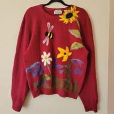 Vintage Wool Crewneck Sweater Maroon Knit with 3D Felted Flowers and Bee Size M - brand is Sears Roebuck and Co. - 100% wool - Floral garden scene made from textured felted wool, possibly added by hand?? - Ribbed dark red maroon knit - crewneck  - slightly oversized fit Approx flat measurements- pit to pit 22", length 25" Very good used condition- there is a dark spot on the back of one sleeve (last photo) Shop Information: Worldwide shipping available. Please contact me for a shipping quote for Felted Flowers, Photo Shop, Red Maroon, Floral Garden, Felt Flowers, Vintage Wool, Fabric Flowers, Oversized Fits, Unique Vintage