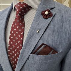 Our pocket squares are made of 100% imported cotton fabric. Some people say you should match your tie or bow tie to your pocket square; others say they shouldn't match. We say as long as you add that extra pop to your jacket pocket, who cares. You’re gonna look good whether is matches or not. Gentleman facts. With the Downtown Striped Burgundy Pocket Square you’ll add that extra flare that completes the look of the modern gentleman, even without a tie or bow tie. We guarantee your satisfaction w Burgundy Pocket Square, Best Wedding Suits For Men, Creative Black Tie, Best Wedding Suits, Blazer Outfits Men, Burnt Red, Vest And Tie, Dapper Day, Wedding 2025