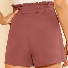 These pleated shorts are absolutely perfect. Featuring a high waist with a sash belt and zippered front. These shorts pair perfectly with a bodysuit or cropped top so be sure and visit our Bodysuits and Tops Collections to complete your look. Made with a blend of polyester and spandex for comfort and style. Fitted High-waisted Shorts In Solid Color, High-waisted Solid Color Shorts For Work, High-waisted Shorts For Work, Chic High-waisted Shorts In Solid Color, Chic High Waisted Shorts With Waistband, Chic High Waist Shorts With Waistband, Chic High-waisted Solid Color Shorts, Chic High Waist Shorts, Chic Solid Color High Waist Shorts