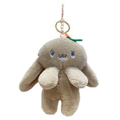 a stuffed animal hanging from a key chain