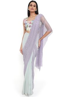 Sea foam georgette embroidered choli and saree with purple mesh pallu. Disclaimer: Since we are a made-to-measure brand and our dyeing process and embroidery are handcrafted, there may be slight variations in the color and embroidery of the actual product. The print placement may also vary from what is represented in the images shown on the product page. Embroidered Purple Georgette Pre-draped Saree, Purple Chanderi Pre-draped Saree For Reception, Festive Fusion Pre-draped Georgette Saree, Purple Organza Pre-draped Saree With Dupatta, Lavender Dupatta With Resham Embroidery For Reception, Festive Lavender Choli With Sheer Dupatta, Traditional Lavender Choli With Sheer Dupatta, Purple Embroidered Saree Fabric For Reception, Lavender Choli With Sheer Dupatta