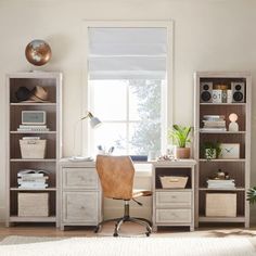 a home office with an open bookcase, desk and chair in front of a window