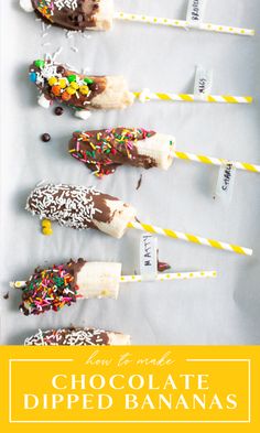 chocolate dipped bananas with sprinkles and candy on them are lined up in a row