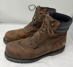 "Vintage brown men Combat Boots with slip oil proof soles and steel-toe  SIZE: MEN US 13 M WIDTH:  4 3/4\" LENGTH OUTSOLE: 13 1/4 HEEL: 1 1/4\" HEIGHT: 8 1/2\" MATERIAL: Leather  COLOR: Brown NOTE: Shoes show light signs of wear on soles, heels and uppers consistent to pre-owned shoes. Made by Wolverine World Wide Inc." Men Work Boots Outfit, Vintage Boots Men, Brown Boots Men, Work Boots Outfit, Shoes Boots Combat, Mens Work Boots, Mens Brown Leather Boots, Mens Brown Boots, Italian Leather Boots