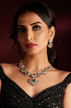 Inspired by the romantic Victorian era, this elegant necklace set is a true masterpiece. Encrusted with sparkling polki stones and adorned with cubic zirconia for added brilliance, it features emerald green stones that add a touch of color and allure. Accompanied by matching earrings, this set is the perfect choice for a formal occasion, exuding timeless charm and sophistication. Finish: Rhodium Plating Material: Silver, Copper Alloy, Emerald, Polki & CZs Color: Green Size: Free Size, Adjustable Hand Jewelry Rings, Chain Braid, Emerald Green Stone, Green Stones, Elegant Necklace, Hand Jewelry, Elegant Necklaces, Charm Set, Anklet Jewelry