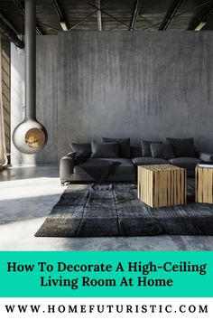 a living room with grey couches and black rugs in the middle, text how to decorate a high - ceiling living room at home