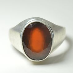 "Natural Certified Hessonite Garnet/Gomed 4.00 to 11.00 carat 92.5 Sterling Silver Astrology Ring For Men & Women.The product in display is a Gemstone and it is finished in an attractive Brown color. Wearing hessonite garnet helps in getting occupational success and fame, social reputation, wealth, marital bliss, and prosperity in life. Its mystic powers protect the wearer against evil spirits, rivals, enemies, dangerous plots, controversies, and the possibility of being poisoned. This fashi Classic Amber Ring With Polished Finish, Modern Polished Finish Gemstones, Untreated Formal Rings, Concave Gemstone Rings As Gift, Classic Sterling Silver Gemstone Ring, Modern Oval Gemstones With Polished Finish, Modern Amber Gemstone Ring, Oval Gemstone Signet Ring Collectible, Amber Birthstone Ring