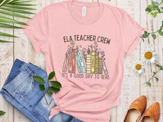 Thank you for checking out my ELA Teacher Crew Shirt listing. These shirts are so soft and comfy. Choose between pink, baby blue, or white.  If you like this lisiting, please check out my shop. I'm a full time teacher that makes laser items, apparel, and ornaments: www.etsy.com/shop/TeamFreitas ELA Teacher Crew Shirts English Teacher Shirt Reading Specialist Shirts Matching ELA Teacher Shirts It's a Good Day to Read Tshirt Read Tshirt, Reading Tshirt, English Teacher Shirt, Reading Specialist, Ela Teacher, It's A Good Day, English Teacher, Crew Shirt, Pink Baby