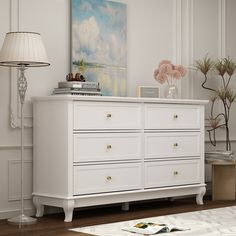 Our 6-drawer dresser is the perfect solution to save space and store scattered and small gadgets. Its delicate design with accent appearance gives color to your life. Crafted with high-quality particle board, durable and non-toxic for your daily use. It features 6 spacious drawers that open smoothly, revealing ample space to tuck away spare linens, shirts, pants, and other wardrobe must-haves. The top leaves plenty of room to turn it into a vanity and add a mirror, or display a table lamp and some framed photos. FUFU&GAGA Contemporary White Double Dresser with 6 Drawers, Modern Design, Wide Drawers, Sturdy Construction, Composite Material | LJY-CX0032-02 Dresser Decor Bedroom, Dresser Wood, White Chest Of Drawers, 7 Drawer Dresser, 9 Drawer Dresser, Chest Dresser, White Dresser, White Chests, Wood Dresser