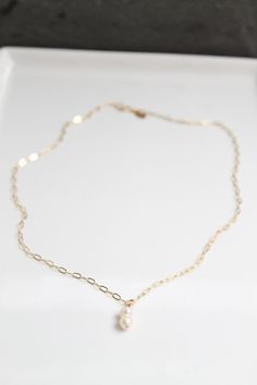 14k gold paperclip chain with freshwater Pearl please add in notes if you would like the necklace with 1 or 2 pearls Everyday 14k Gold-filled Pearl Charm Necklaces, Delicate 14k Gold-filled Paperclip Chain Jewelry, Delicate 14k Gold Filled Paperclip Chain Jewelry, Classic Gold Charm Necklace With Pearl Drop, 14k Gold Filled Paperclip Necklace With Adjustable Chain, 14k Gold-filled Necklace With Adjustable Paperclip Chain, Dainty 14k Gold-filled Pearl Chain Jewelry, Dainty 14k Gold Filled Pearl Chain Jewelry, Everyday 14k Gold-filled Pearl Necklace With Delicate Chain