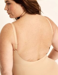 You asked, we delivered. Meet the new no-panty-line shapewear with a customizable back plunge. Smoothes and shapes flawlessly and comfortably. It’s designed to keep everything supported and even has a fully integrated, built-in bra (sizes go all the way up to a G cup). So you’re supported even when you make your PerfectCut™ to deepen your back plunge and go backless. Just cut along the velvet lines. Your perfect base layer for tight fits, low backs and no panty lines. | Knix Customizable Shaper Thong Bodysuit in Warm Sand Brown G Cup, Wireless Bras, Wireless Bra, All The Way Up, Base Layer, Sports Bras, Bra Sizes, Shapewear, Sports Bra