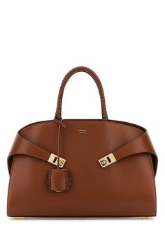 salvatore-ferragamo-handbags-1724434288297028464-0 Salvatore Ferragamo Handbags, Ferragamo Handbags, Valentino Garavani Bag, Woman Bags Handbags, Saint Laurent Shoes, Sneaker Wedge, Womens Tote Bags, Salvatore Ferragamo, Bags Handbags