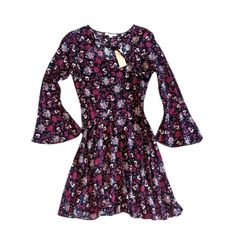 American Eagle Women's Dress Size Xs Boho Bell Sleeve Fit & Flare Floral Printed Design Nwt Colors Are Black, And Purple/ Maroon Multicolor Long Bell Sleeves Keyhole Tie Front Side Zip Scoop Neck Tie Front Short Fit & Flare Excellent Pre-Loved Condition **Approximate Measurements Armpit To Armpit: 16" Waist: 12" Shoulder To Hem: 34" **Material Content 100% Viscose **Flaws** None Noted Please Feel Free To Ask Any Questions. Thank You For Looking! Purple Stretch Dresses For Fall, Purple Stretch Dress For Fall, Purple Mini Dresses For Fall, Casual Fitted Purple Dress, Fitted Casual Purple Dress, Casual Flowy Purple Dress, Fitted Purple Mini Dress For Fall, Casual Purple Dresses For Fall, Purple Mini Dress For Fall