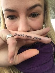 a woman holding her finger up to her mouth with the word trust rein here written on it