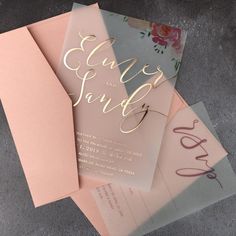 wedding stationery with pink and gold foiling on the front, inside and outside