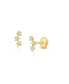 small gold plated earrings with cubics and stars on the outside, set against a white background