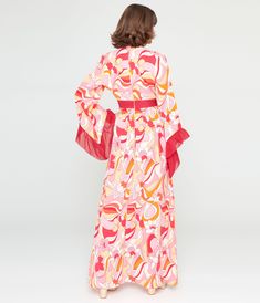 A charming 1960s maxi silhouette crafted in a smooth and lightweight woven fabric that dances with a psychedelic floral print in shades of pink, red, white, and orange. Outfitted with three-quarter length sleeves that dance with ruffled chiffon-style fabric while a back zipper nips in the empire waist.Available in sizes XS-5X while supplies last. Chiffon Style, Chiffon Fashion, White And Orange, Chiffon Ruffle, Silhouette Crafts, Shades Of Pink, Floral Maxi, Vintage 1960s, Floral Maxi Dress