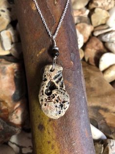 "One of a kind piece made with hand picked river rock from Jane, Mo. Besides the drill hole, the shape and characteristics of the rock are natural and unaltered.  Pendant is approx. 2\"x 5/8\" and comes with a 24\" silver chain.  All items are pre-made so you will receive item as pictured." Rock Necklace, River Rock, Hand Picked, The Rock, Pendant Necklaces, Dog Tag Necklace, Washer Necklace, Silver Chain, Necklace Etsy