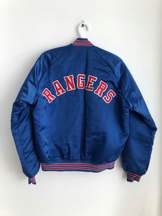 a rangers jacket hanging on the wall