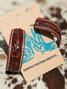 Western Brown Hand-tooled Jewelry, Western Brown Stamped Jewelry, Western Style Stamped Brown Jewelry, Adjustable Brown Hoop Jewelry, Western Stamped Brown Jewelry, Adjustable Brown Hoop Earrings, Western Style Hand-tooled Leather Jewelry, Western Hand-tooled Leather Jewelry, Tooled Leather Phone Case