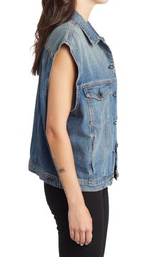 This oversized nonstretch-denim vest features soft fading for a lived-in vibe and an array of handy pockets to store your essentials. 22 1/2" length (size Medium) Front button closure Spread collar Chest button-flap patch pockets; side-seam pockets 100% cotton Machine wash, line dry Made in the USA Casual Sleeveless Denim Vest With Pockets, Relaxed Fit Denim Vest With Pockets, Spring Utility Denim Sleeveless Vest, Spring Utility Sleeveless Denim Vest, Summer Utility Style Sleeveless Denim Vest, Trendy Medium Wash Vest, Spring Sleeveless Utility Denim Vest, Trendy Denim Vest With Pockets, Casual Medium Wash Sleeveless Vest