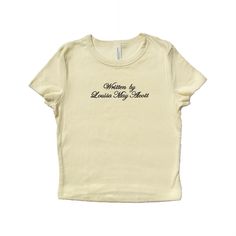 Baby tee with "Written by [Author Name]" embroidered in polyester thread. T-shirt will feature the font and colors shown in example photos. Available in natural w/ black lettering and black w/ pink lettering. A thoughtful gift for your bestie that loves to read. <3 Soft, mid-length shirt for the perfect baby tee fit! Fabrication: 52% Airlume combed and ring-spun cotton, 48% polyester 32 single, 5.4oz Want a different embroidery color? Message us! We have a large variety of colored thread to choose from. Embroidery Placement, Concert Vibes, Laura Prepon, Palm Bay, Baby T Shirts, National Anthem, Baby Tee, Embroidered Shirt, Graphic Tees Women