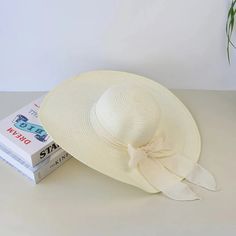 Your Must-Have Summer Accessory Embrace the sunny days with our Chic Summer Straw Sun Hat, designed to offer both style and functionality. Whether you're lounging by the beach, gardening, or enjoying an outdoor brunch, this hat provides the perfect shade and a fashionable touch to your summer outfits. Its wide brim and charming bowknot detail ensure you stay cool and look great, no matter the occasion. Key Features High-Quality Materials: Crafted from a blend of straw and polyester, our sun hat Outdoor Brunch, Small Animal Supplies, Straw Sun Hat, Plastic Ware, Sun Cap, Hat Stands, Beauty Equipment, Home Icon, By The Beach