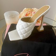 White Quilted Mules By Ego Shoes. Only Tried On, Never Worn Out. Shoes Come With Original Box. White Synthetic Closed Toe Heels, White Synthetic Closed-toe Heels, Casual White Heels With Cushioned Footbed, Trendy White Synthetic Heels, White Slip-on Heels With Cushioned Footbed, White Cushioned Slip-on Heels, White Almond Toe Sandals With Padded Heel, White Almond Toe Heels With Padded Heel, White High Heels With Cushioned Footbed