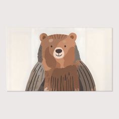 a brown bear standing on top of a white wall