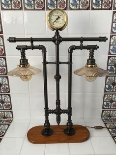 a clock sitting on top of a wooden stand in front of tiled walls and floor