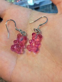 A pair of pink gummy bear earrings. **Stainless steel **Due to lighting, product may look blurry or discoloured. Gummy Bear Earrings, Bear Earrings, Gummy Bear, Gummy Bears, Fun Earrings, Jewelry Earrings Dangle, Etsy Earrings, Beauty Book, Dangle Drop Earrings