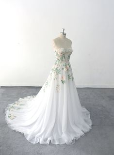 Green Vintage Wedding Dress, Colored Lace Wedding Dress, White Wedding Dress With Sage Green Accents, Sea Green Wedding Dress, Wedding Dresses With Green Detail, Elven Style Wedding Dress, Attachable Wedding Skirt, Vine Embroidered Wedding Dress, Light Green Wedding Dress For Bride