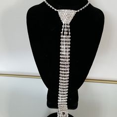 Stunning Rhinestone Fashion Jewelry Tie..Length Of Tie Is 11.5..Adjustable Chain Adjustable Rhinestone Necklaces For Party, Adjustable Rhinestone Necklaces For Evening, Adjustable Rhinestone Evening Necklace, Adjustable Bling Necklaces For Evening, Adjustable Sparkling Rhinestone Necklace, Glamorous Adjustable Rhinestone Necklace, Glamorous Adjustable Rhinestone Necklace For Formal Events, Adjustable Metal Rhinestone Necklace With Bling, Silver Adjustable Rhinestone Costume Necklace