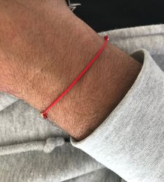 "Bracelet Red string cord adjustable size. Bracelets Are Unisex - Anyone Can Wear It. Nylon thread cord does not fade or stain skin, perfect for everyday wear! ▫️SIZE Easily adjustable by moving the knots closer or away. ▫️ ANKLET each opens from 9\" to 12 inches. ( ONE SIZE ) ▫️ BRACELET each opens from 6 to 7.5 inches. ( ONE SIZE ) ▫️MATERIAL 925 sterling silver 3mm beads Gold Filled 925 silver beads 100% Nylon Multiple Cord ▫️Please Contact Me With Any Questions. Check out our shop for more a Minimalist Nylon Cord Bracelets As Gifts, Adjustable Red Bracelets For Everyday, Red Adjustable Bracelets For Everyday, Minimalist Red Friendship Bracelet With Sliding Knot, Casual Red Resizable Friendship Bracelets, Red Waxed Cord Friendship Bracelets, Red Waxed Cord Bracelet With Sliding Knot, Casual Red Friendship Bracelets With Adjustable Cord, Red Minimalist Bracelet For Everyday Wear